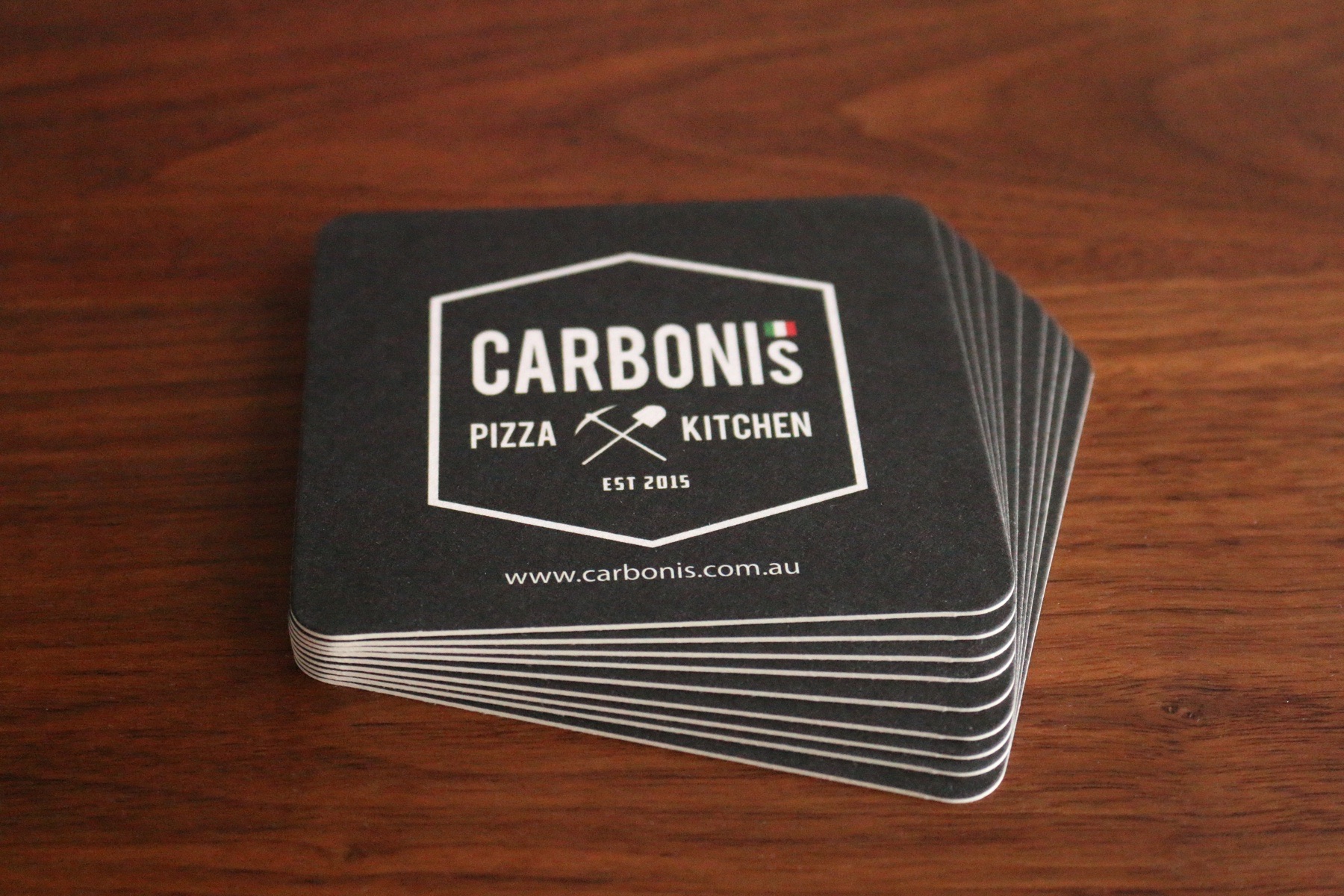 Custom printed square coasters on absorbent board